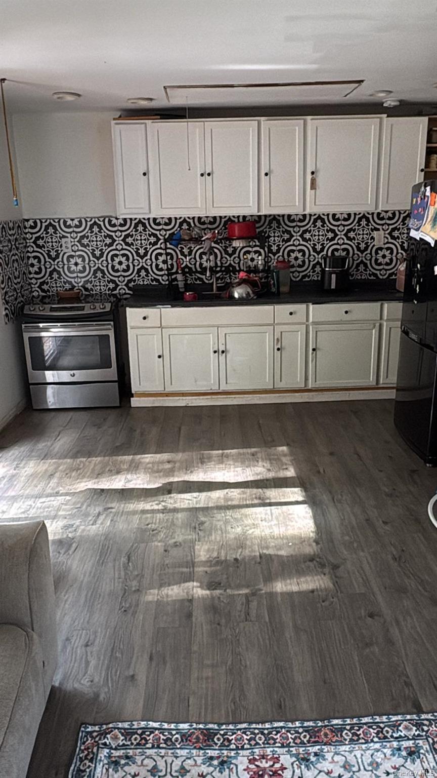 15 Medallion Road Kiamesha Lake, NY 12751 - Photo 5 of 6 a view of a kitchen has white cabinets
