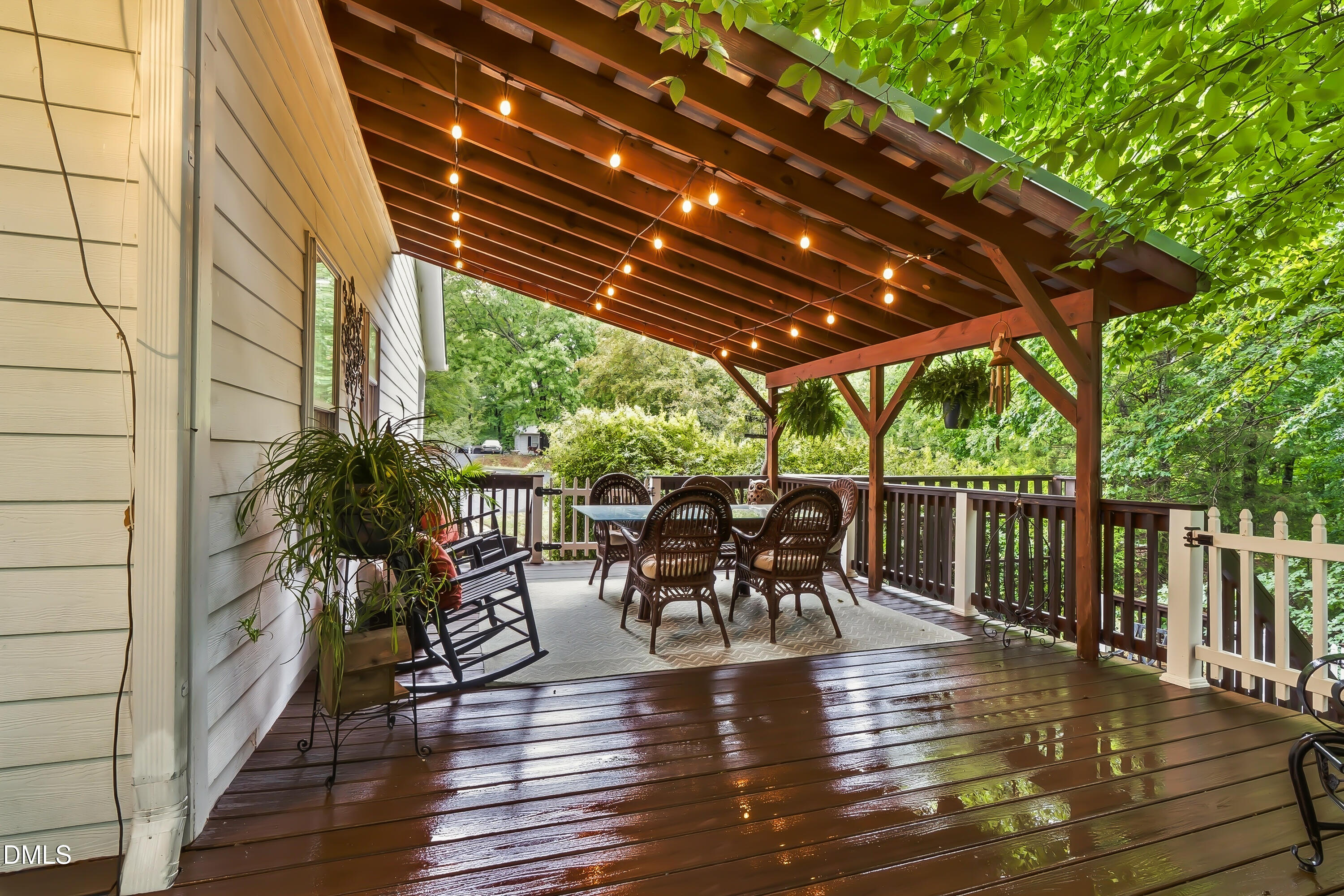 1214 Halcyon Place Rougemont, NC 27572 - Photo 41 of 69 a patio with wooden floor a yard tables and chairs