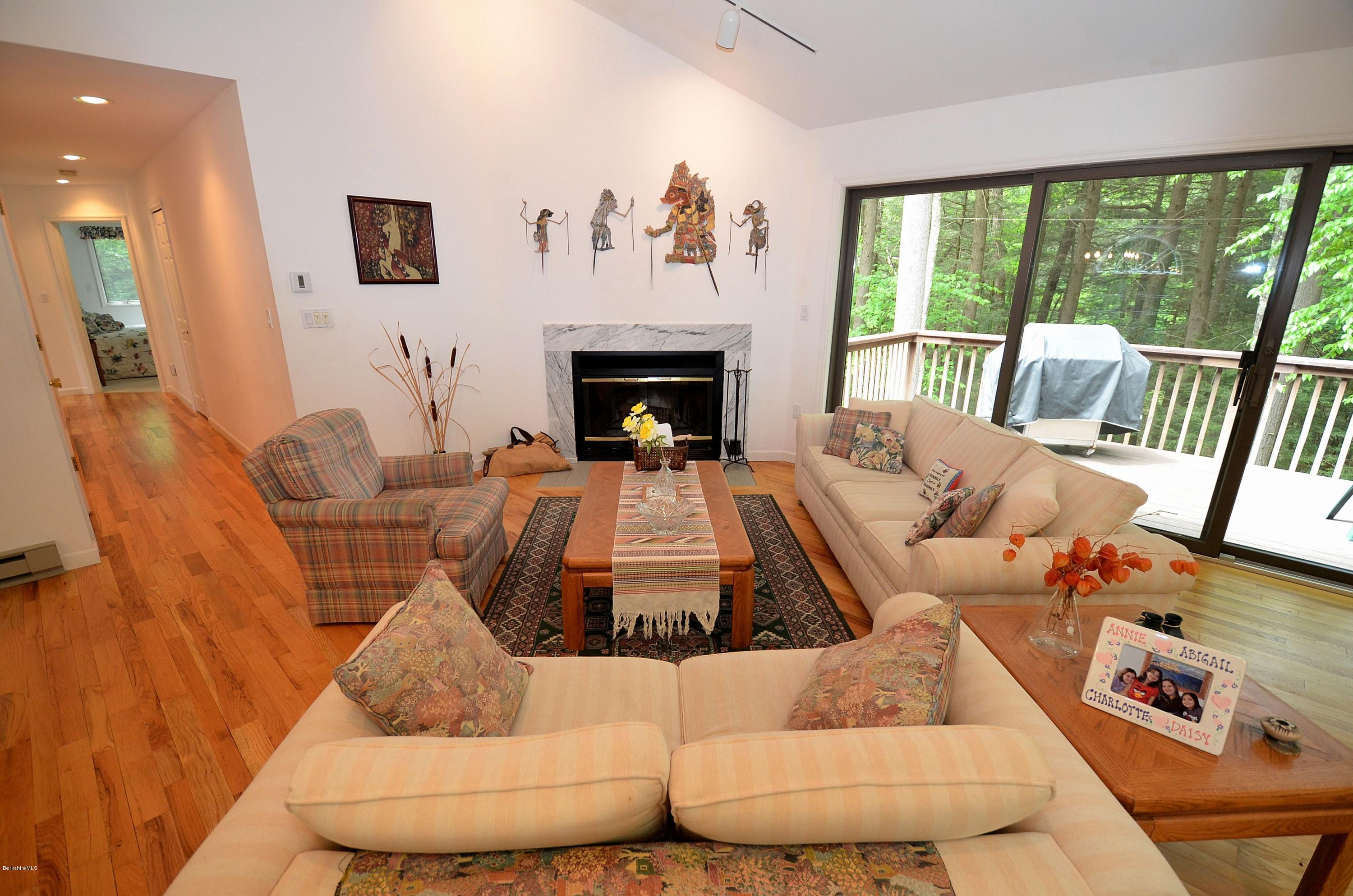 52 Monterey Road Tyringham, MA 01264 - Photo 4 of 10 a living room with furniture and a fireplace