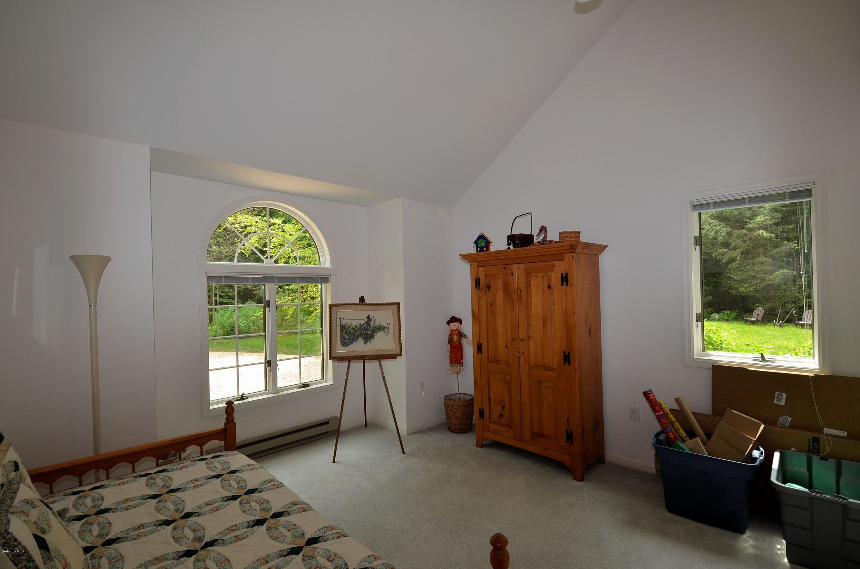 52 Monterey Road Tyringham, MA 01264 - Photo 8 of 10 a view of an empty room with a window