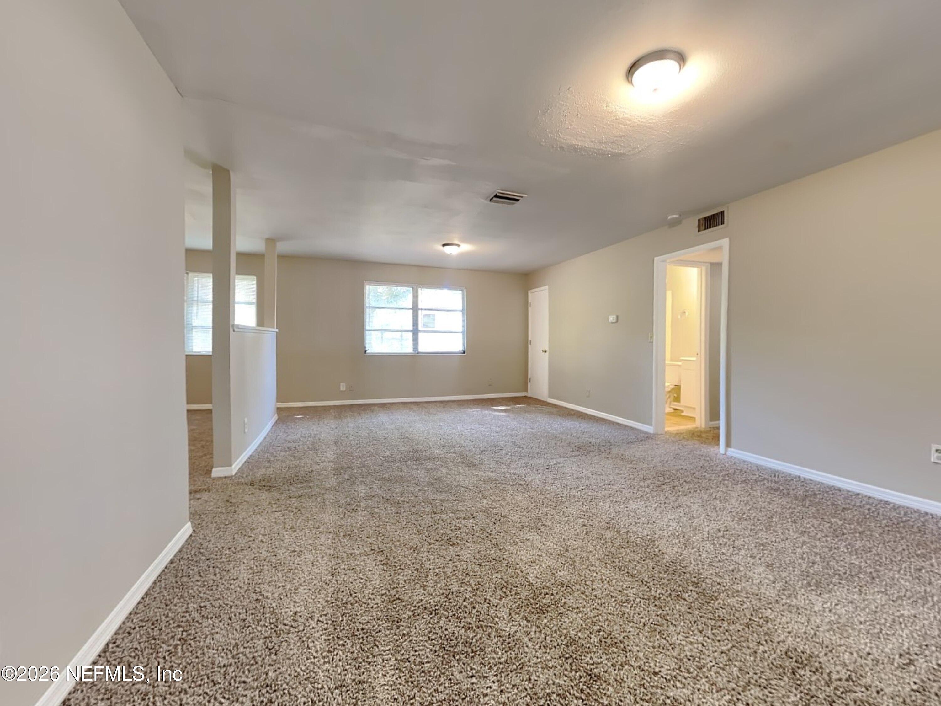 2005 Figaro Lane Jacksonville, FL 32210 - Photo 3 of 23 2_Living_Room-01_pc_0kkg5dLObB_jTNCcaArw