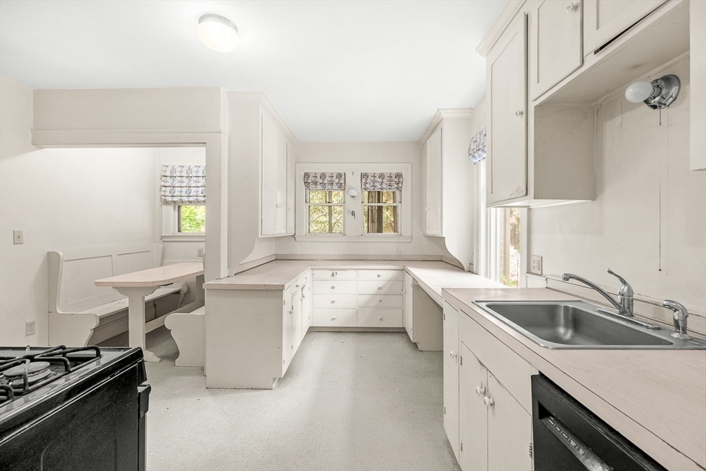 30 Rangeley Road Winchester, MA 01890 - Photo 14 of 42 a kitchen that has a sink and a stove