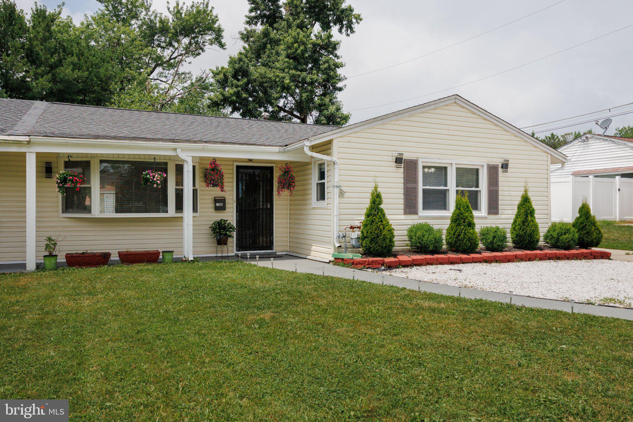 2106 North Rolling Road Windsor Mill, MD 21244 - Photo 1 of 24 Charming home with vibrant landscaping.