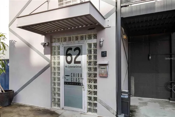 a front view of a house with stairs