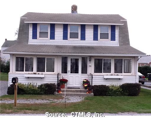 a front view of a house with porch
