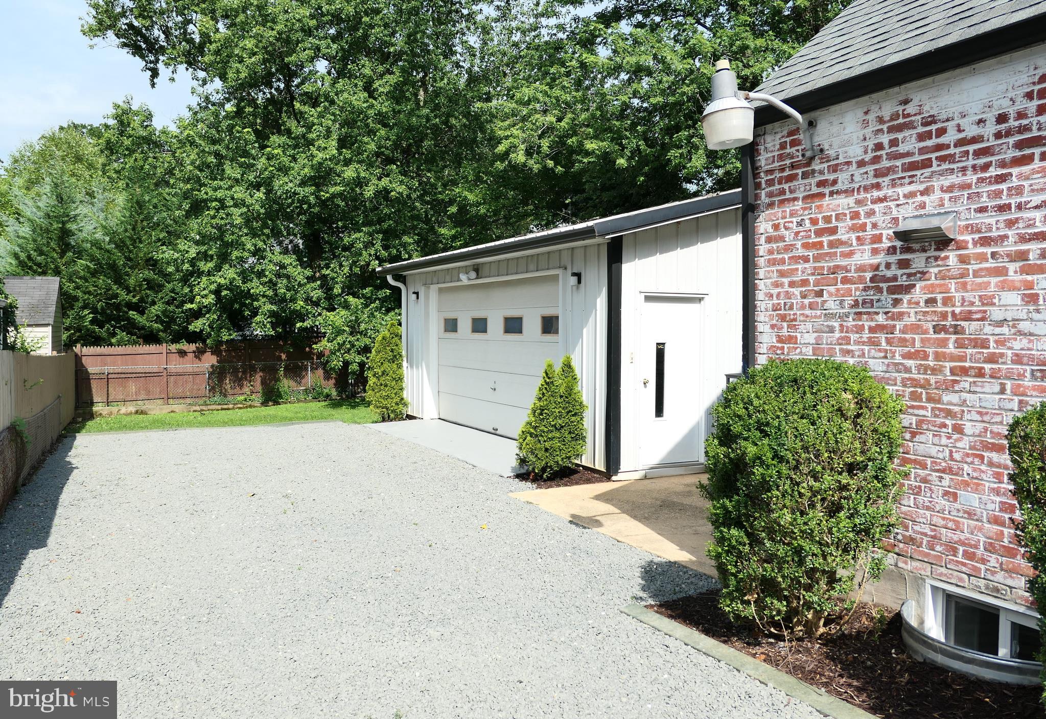 Side of House with Garage in Rear
