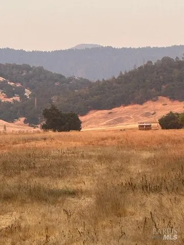 a view of lake with mountain
