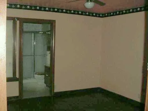 a bathroom with a mirror