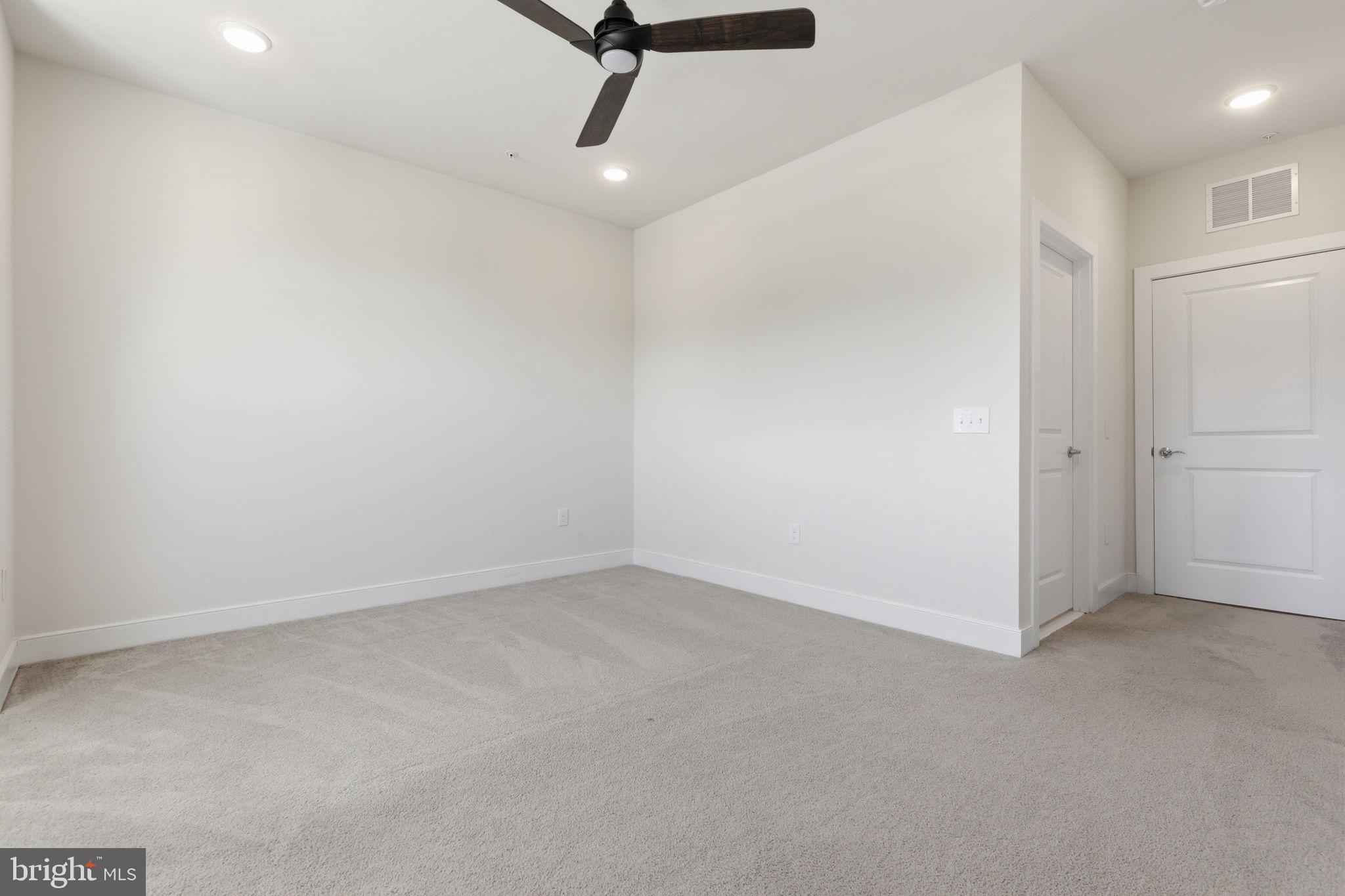 11200 Reston Station Boulevard, Unit 205 Reston, VA 20190 - Photo 19 of 39 Main Bedroom