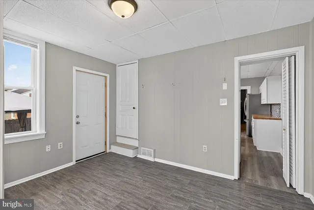 a view of storage and utility room with washer and dryer