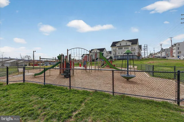 a view of a golf course with a lake view
