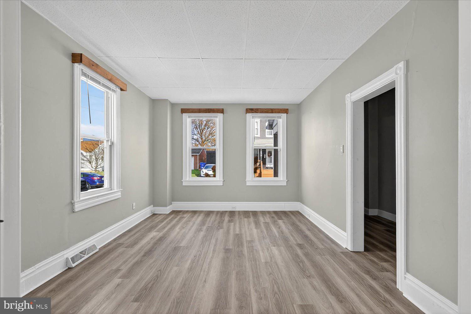 934 North Queen Street York, PA 17404 - Photo 7 of 35 wooden floor in an empty room with a window