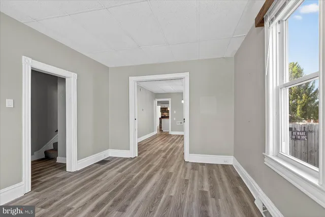 a view of livingroom with hardwood floor and window