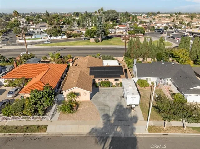 an aerial view of a house with a lake view