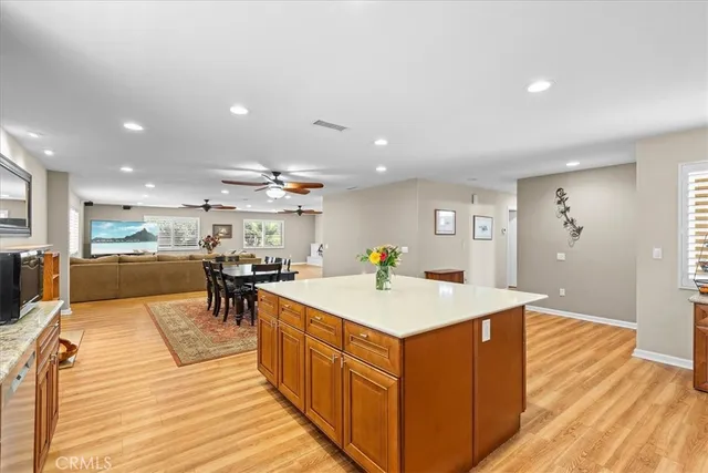 a view of kitchen with wooden floor