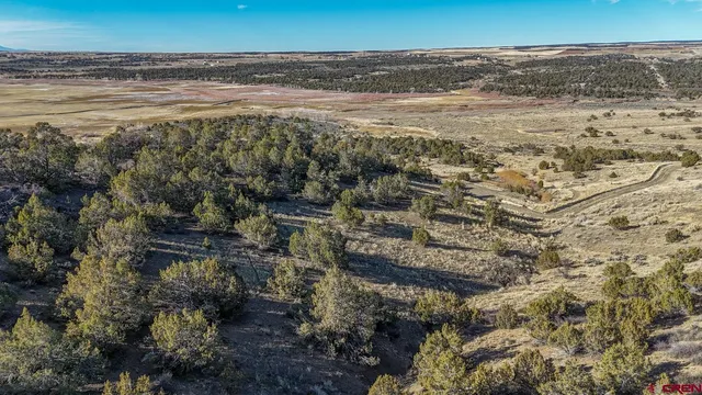 a view of an ocean and mountain