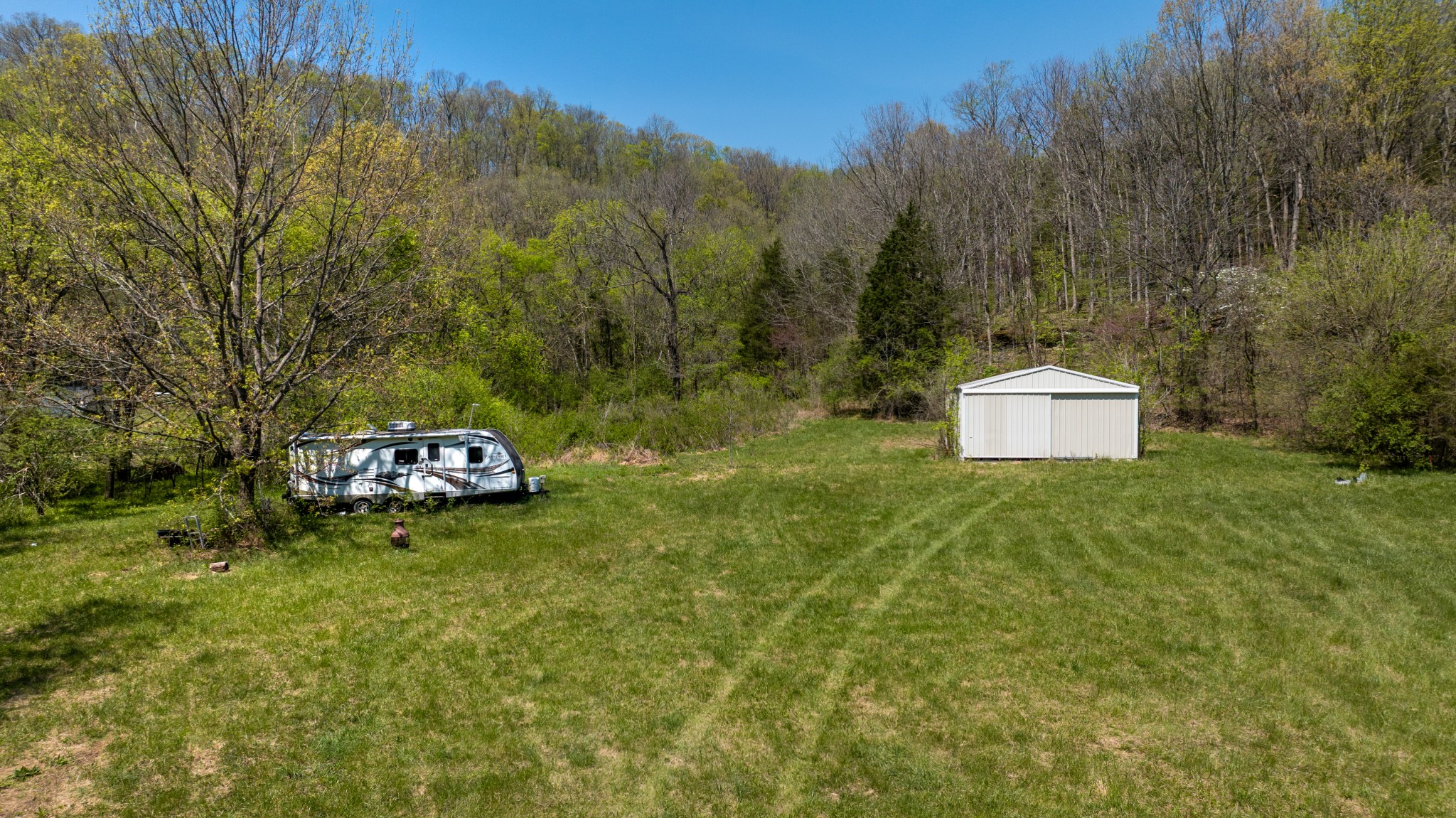 510B Rogues Fork Road Bethpage, TN 37022 - Photo 32 of 36 a backyard of a house with lots of green space