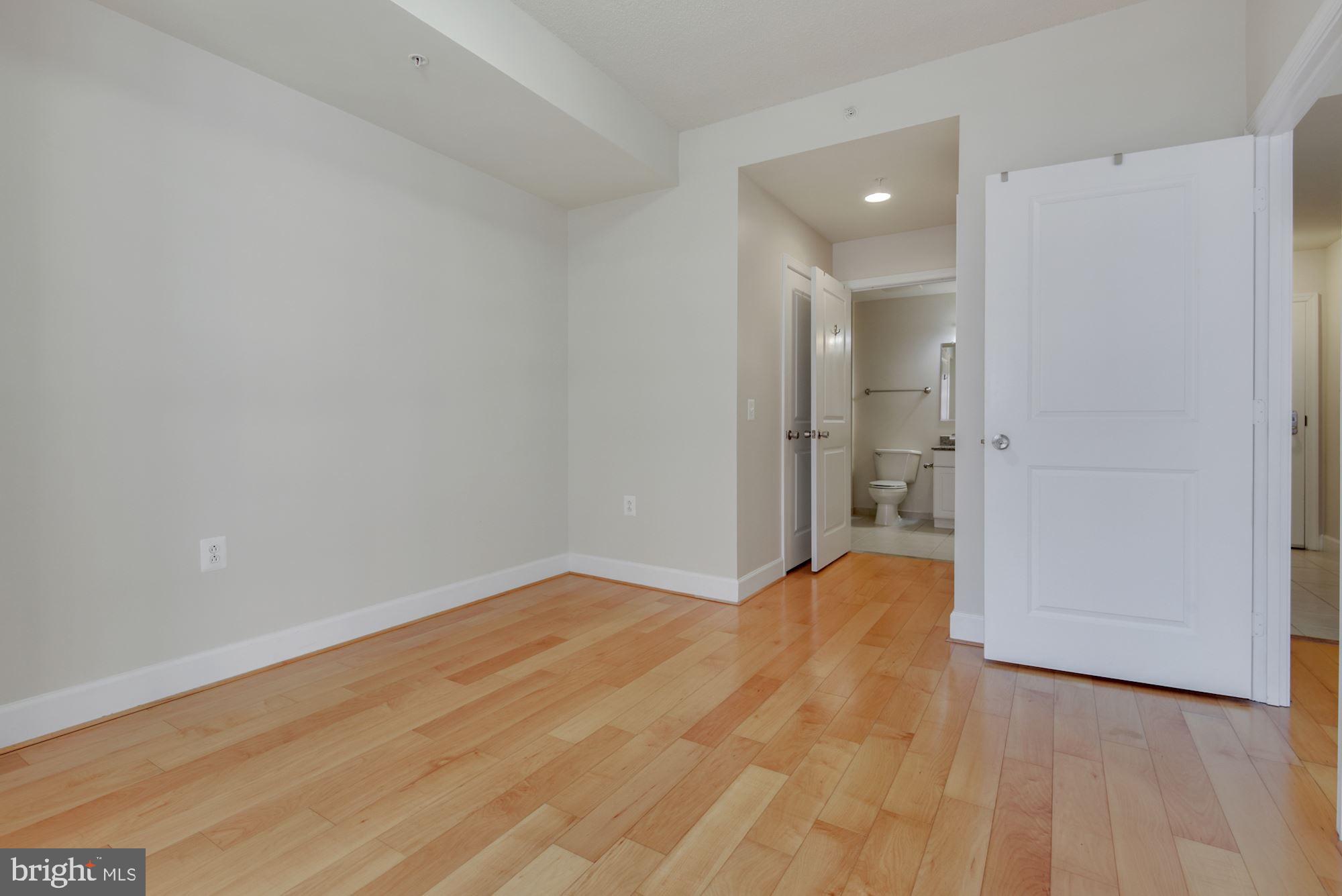 3600 South Glebe Road, Unit 434W Arlington, VA 22202 - Photo 13 of 36 a view of a room with wooden floor and a sink