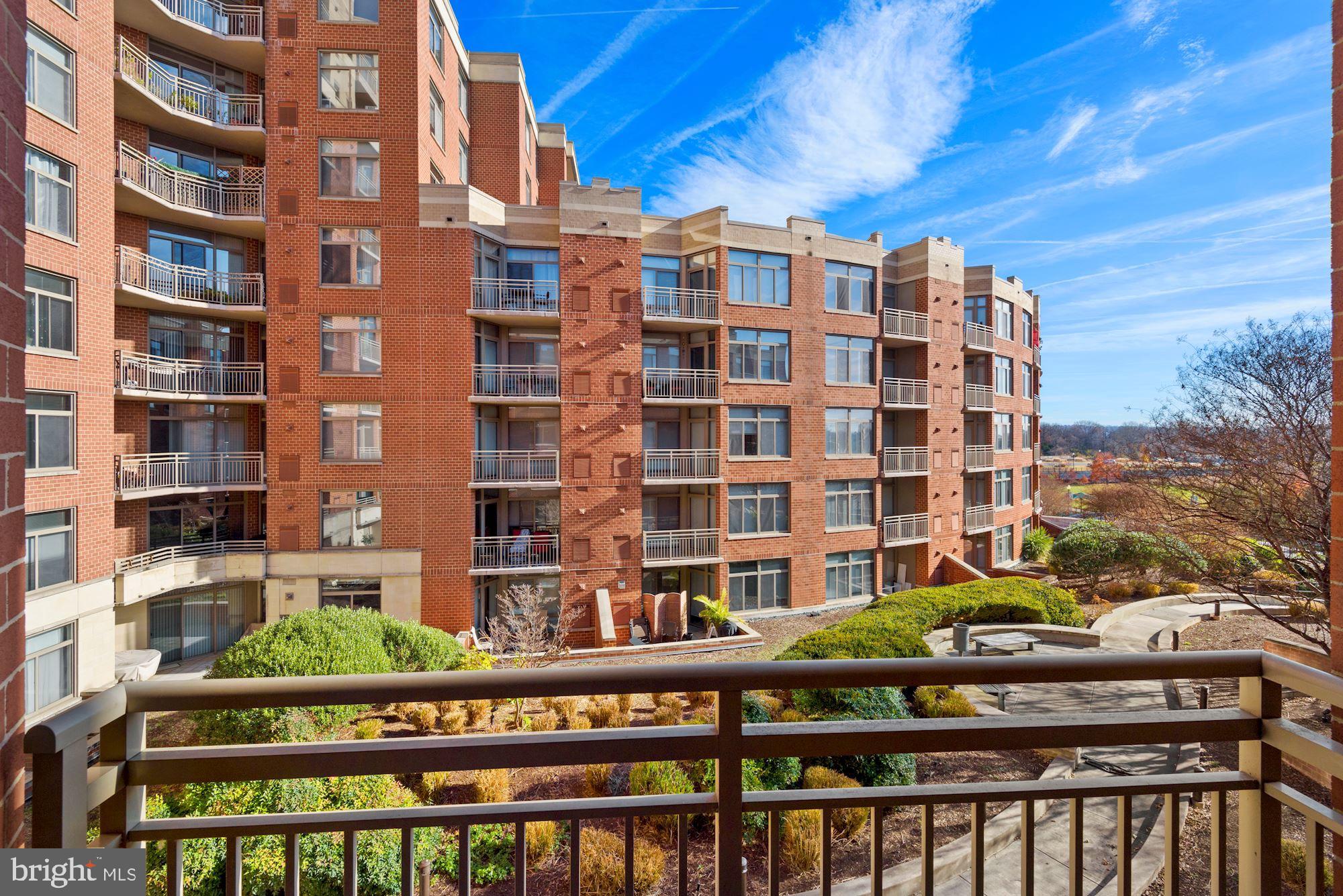 3600 South Glebe Road, Unit 434W Arlington, VA 22202 - Photo 21 of 36 a front view of a building with glass windows