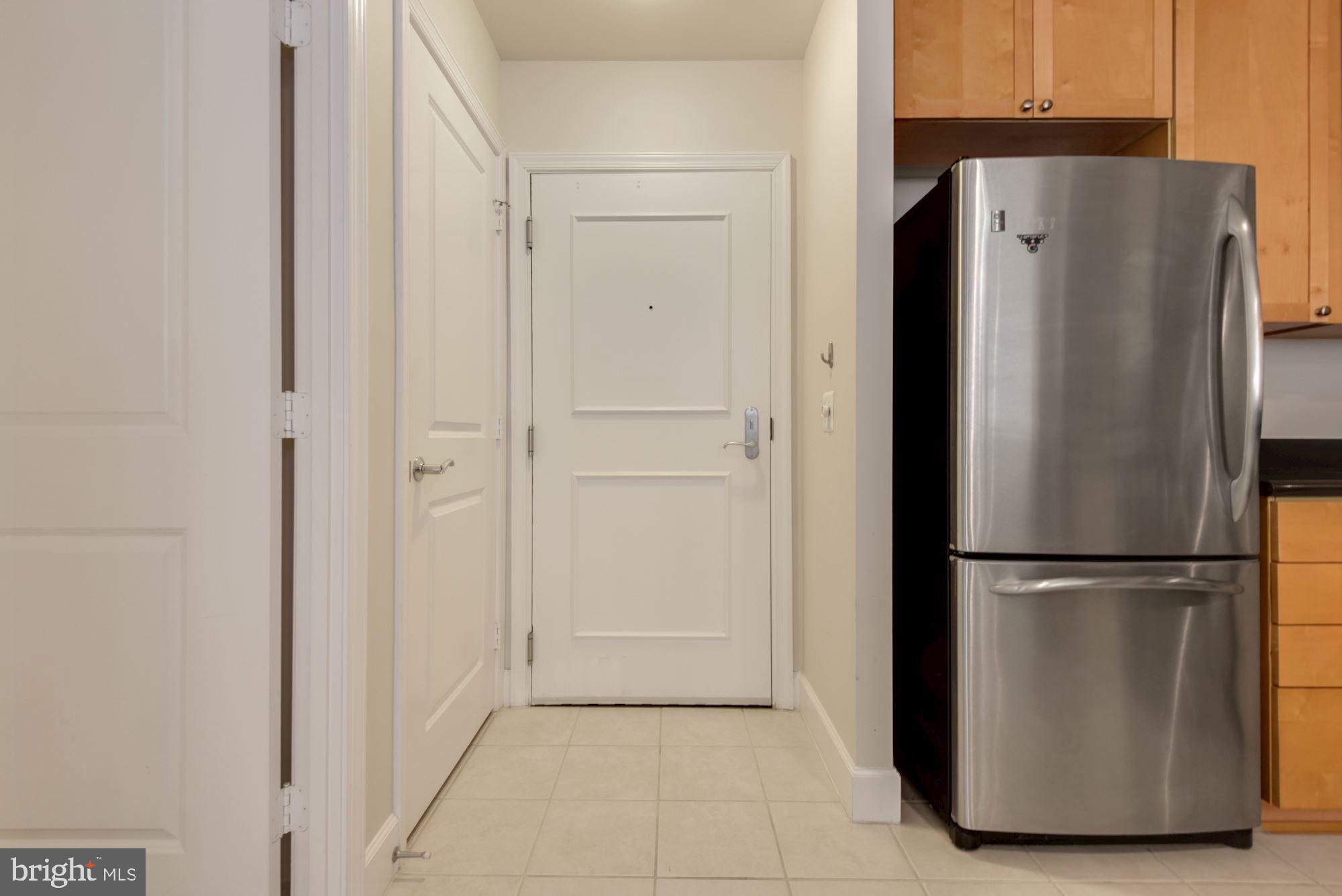 3600 South Glebe Road, Unit 434W Arlington, VA 22202 - Photo 6 of 36 a view of a refrigerator in kitchen and a refrigerator