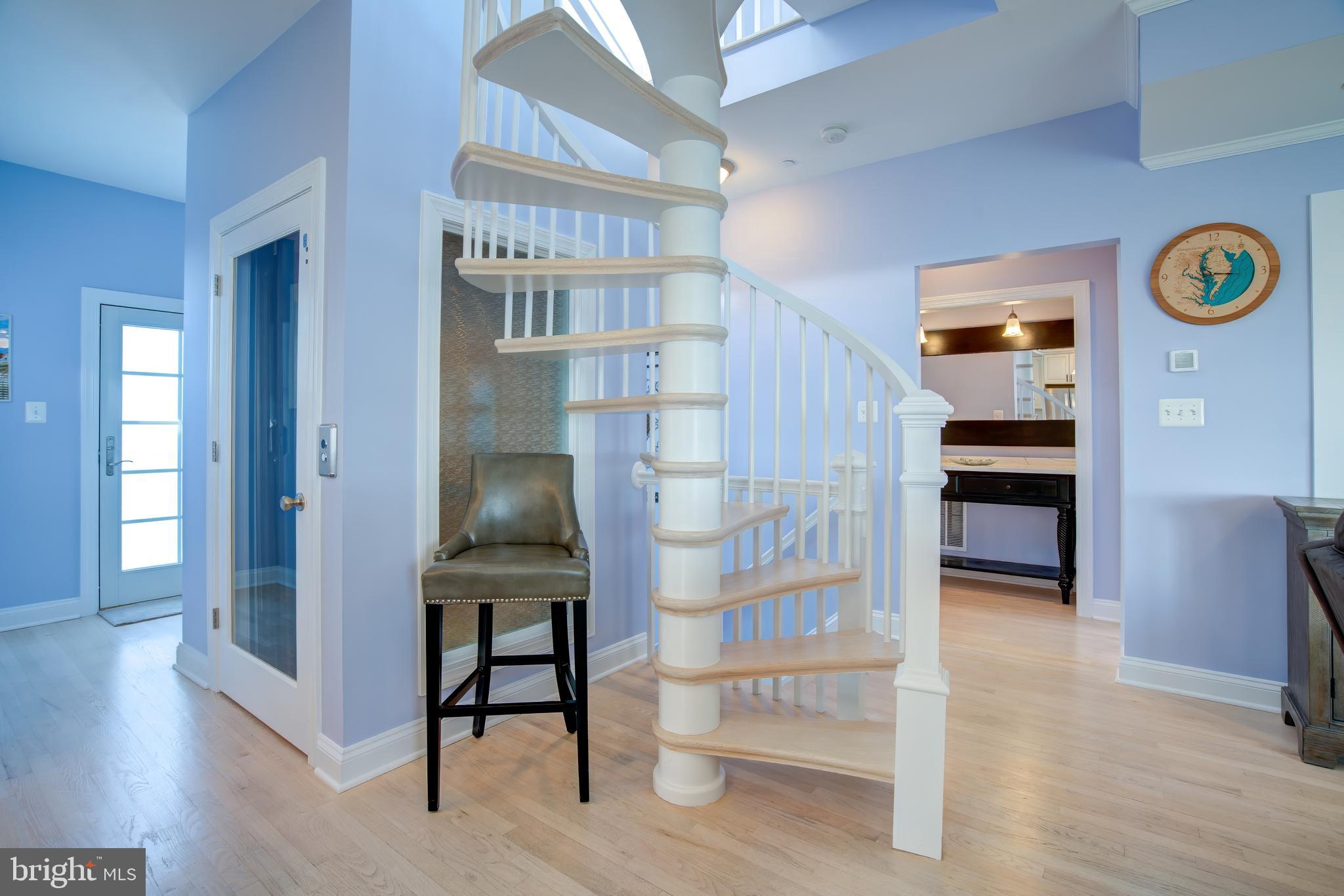 2811 Bay Drive Sparrows Point, MD 21219 - Photo 16 of 66 a view of hall way with furniture and wooden floor