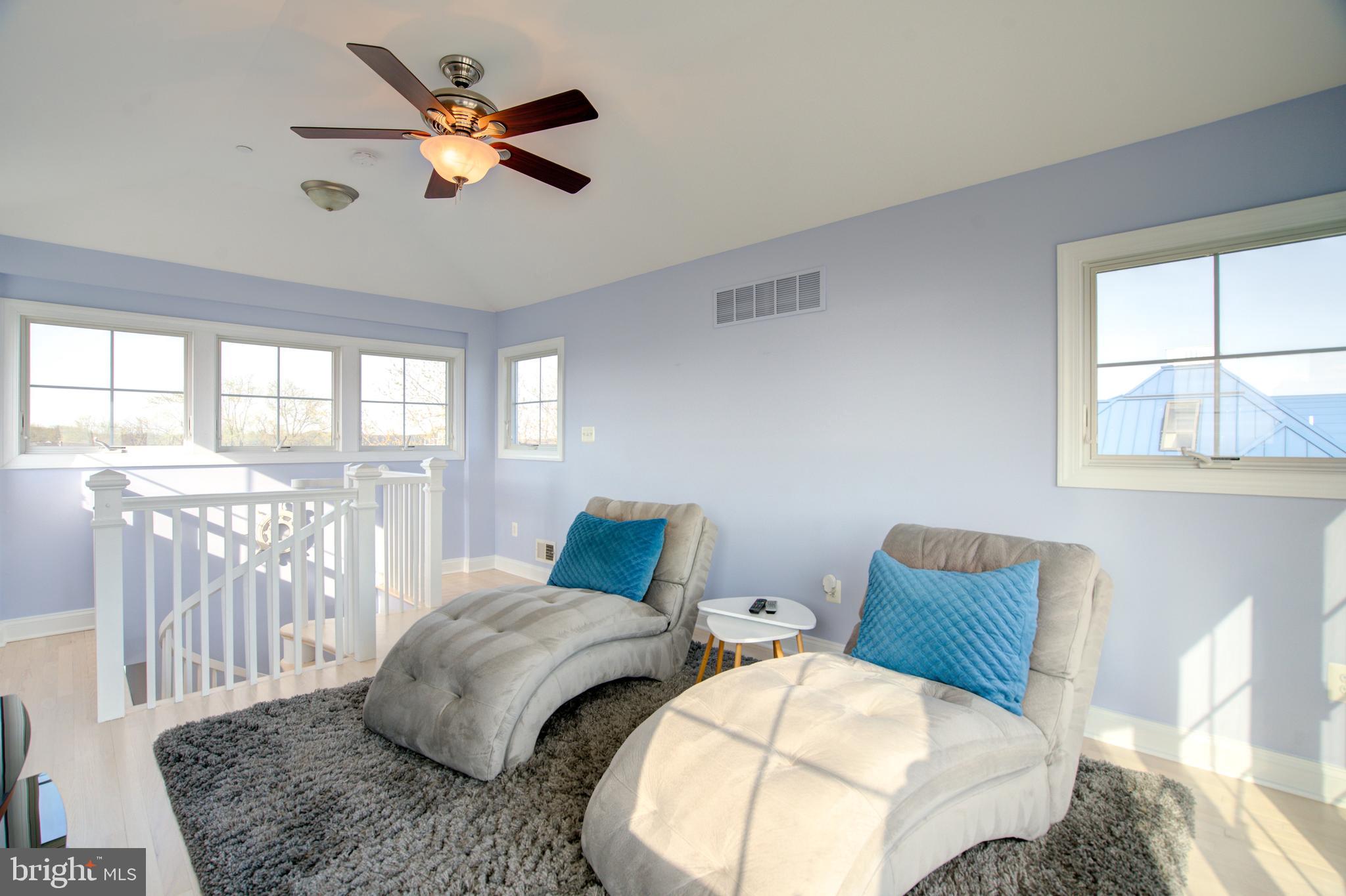 2811 Bay Drive Sparrows Point, MD 21219 - Photo 30 of 66 a bedroom with furniture and a large window