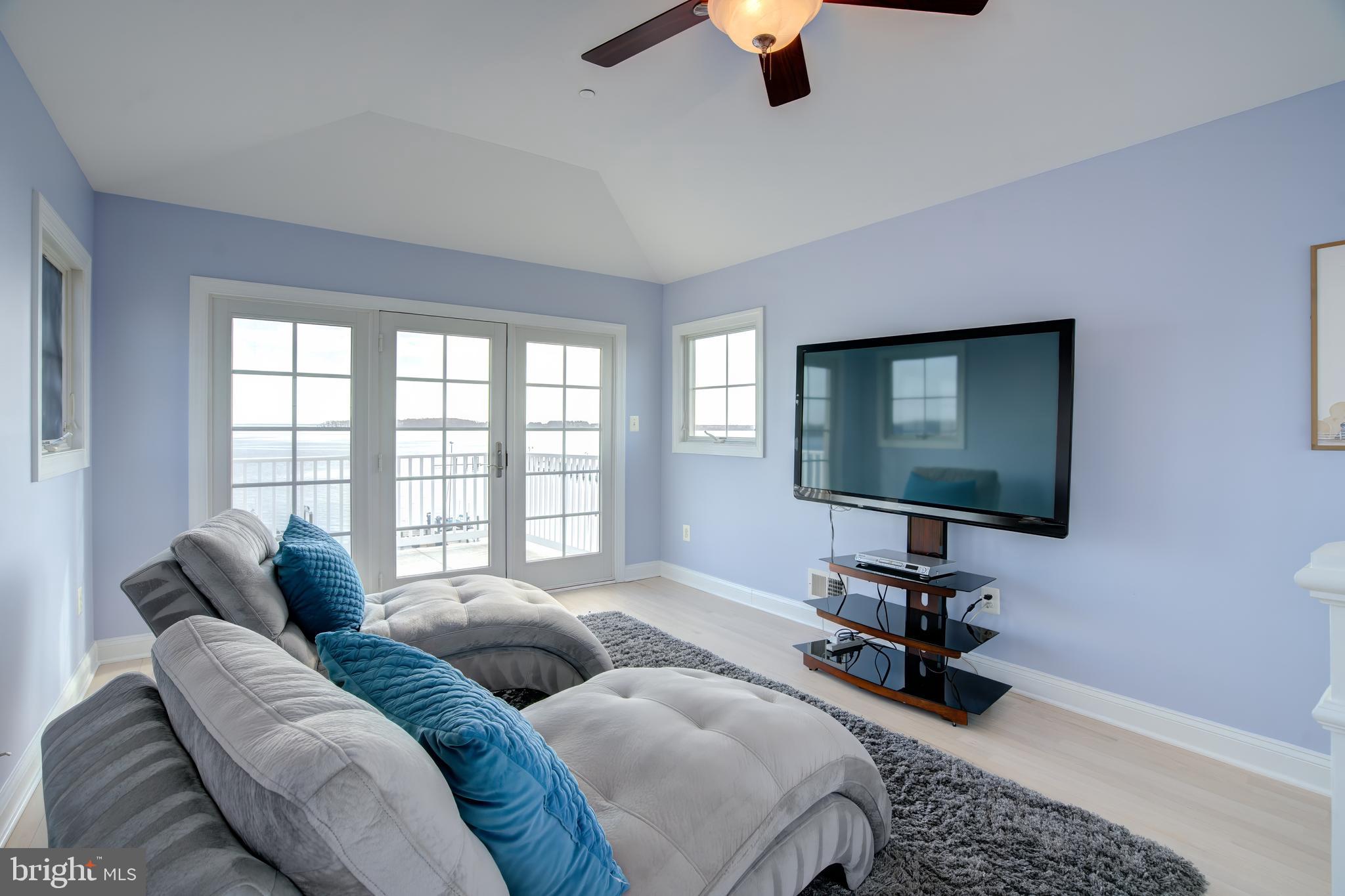 2811 Bay Drive Sparrows Point, MD 21219 - Photo 31 of 66 a living room with furniture and a flat screen tv