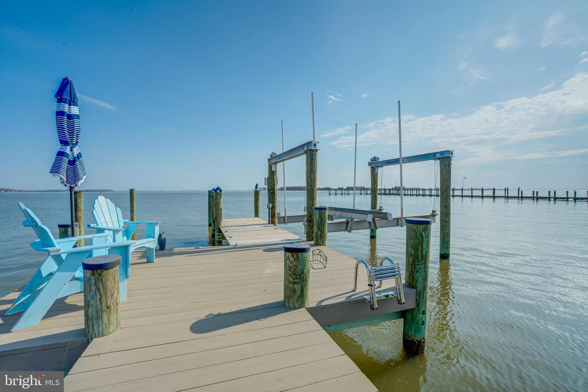 2811 Bay Drive Sparrows Point, MD 21219 - Photo 39 of 66 a living room with furniture a rug and white walls