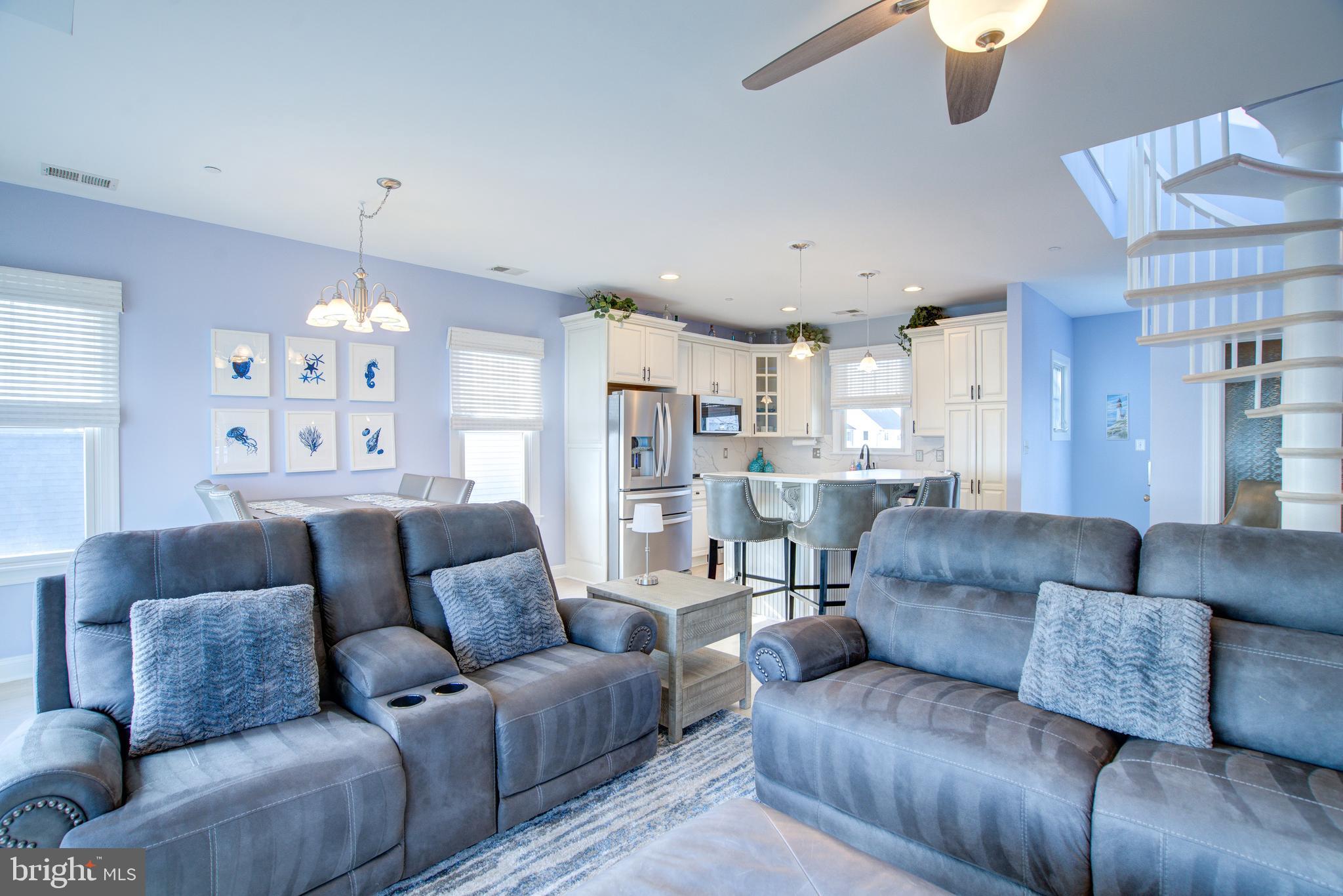 2811 Bay Drive Sparrows Point, MD 21219 - Photo 62 of 66 a view of a living room kitchen and a chandelier