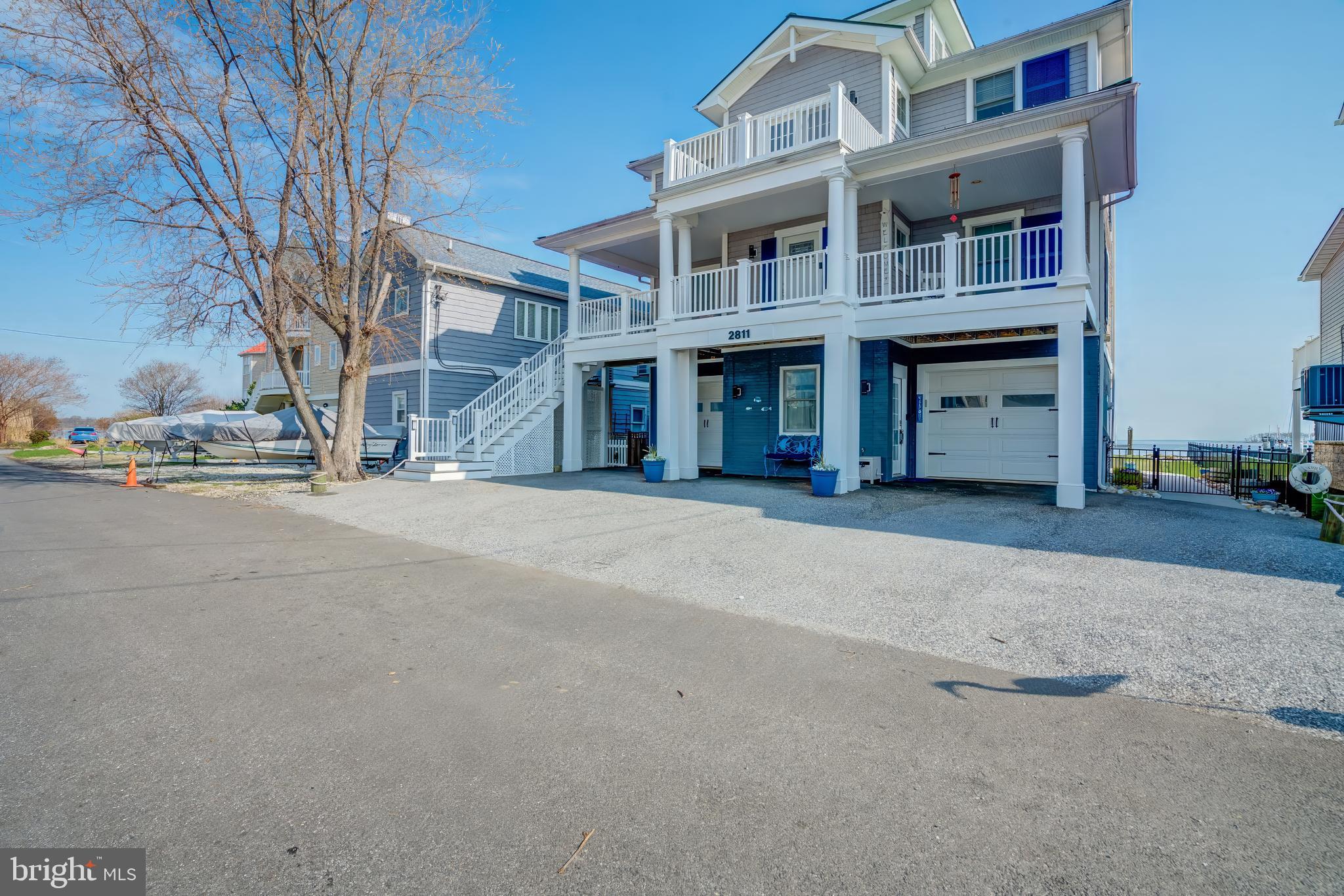 2811 Bay Drive Sparrows Point, MD 21219 - Photo 49 of 66 a front view of a building with a road