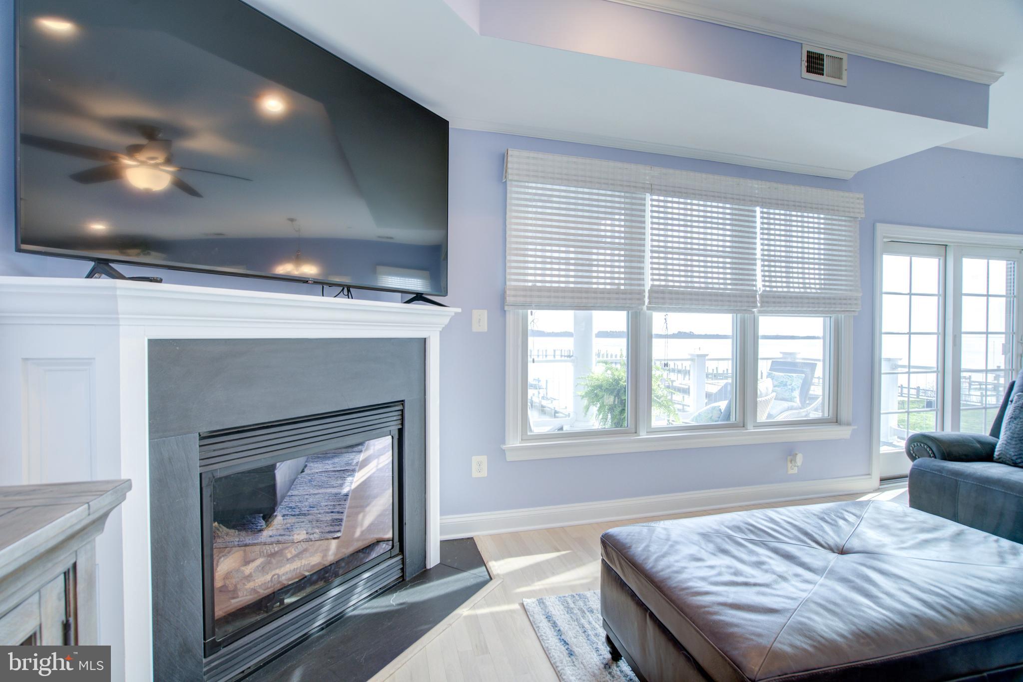 2811 Bay Drive Sparrows Point, MD 21219 - Photo 64 of 66 a bedroom with a bed and a fireplace