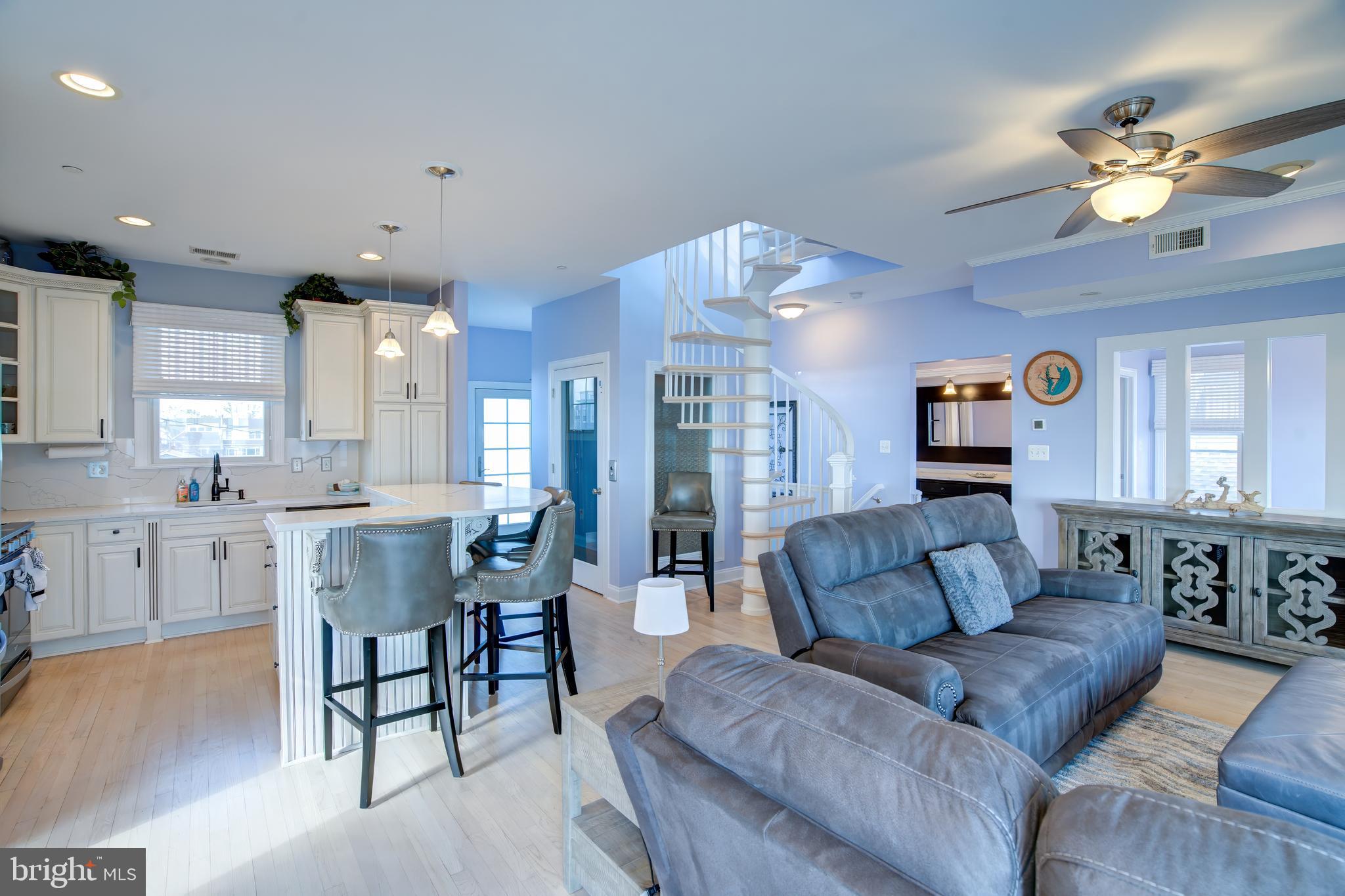 2811 Bay Drive Sparrows Point, MD 21219 - Photo 65 of 66 a living room with furniture and a chandelier