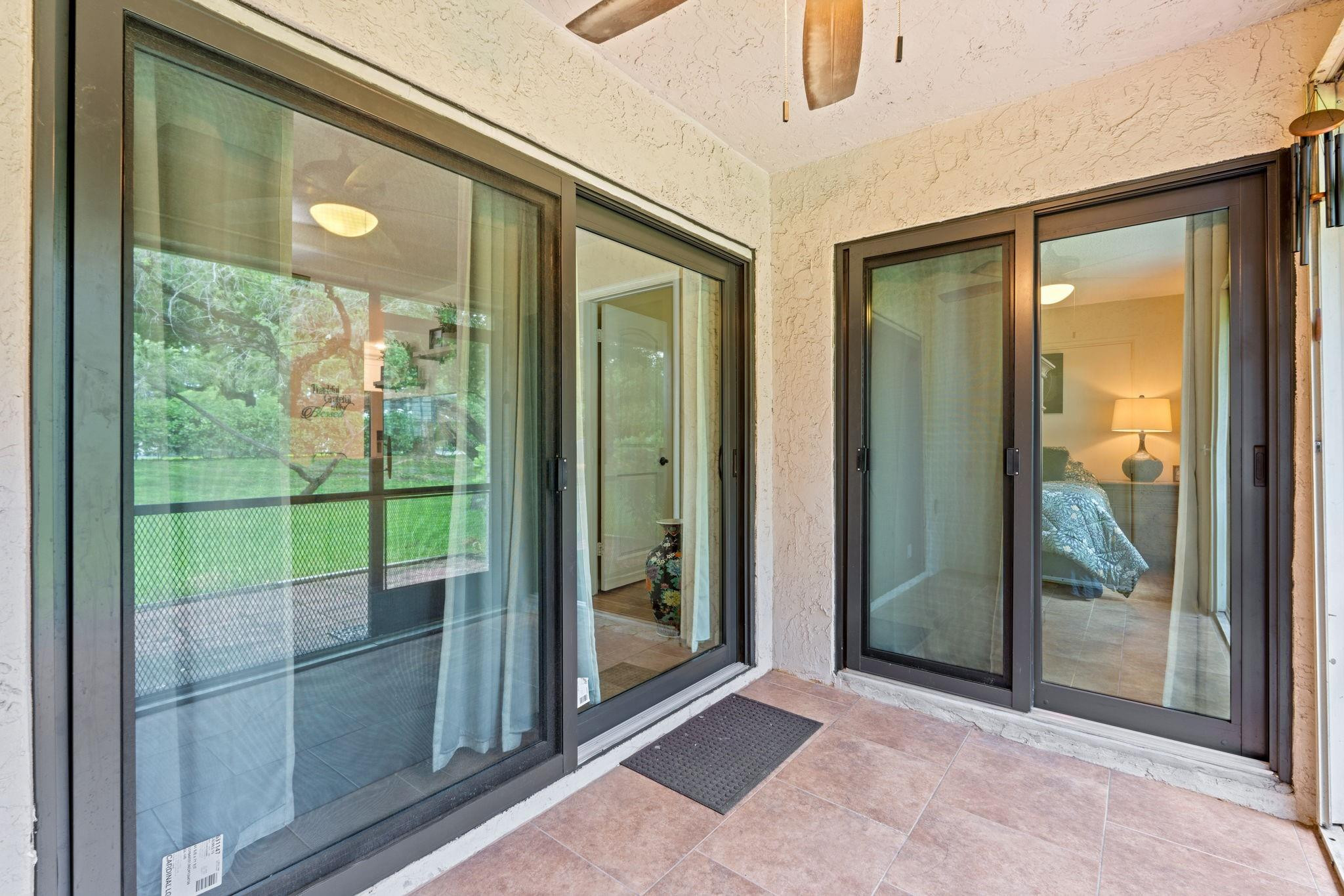 9601 Riverside Drive, Unit A6 Coral Springs, FL 33071 - Photo 20 of 25 a view of a glass door with a sink