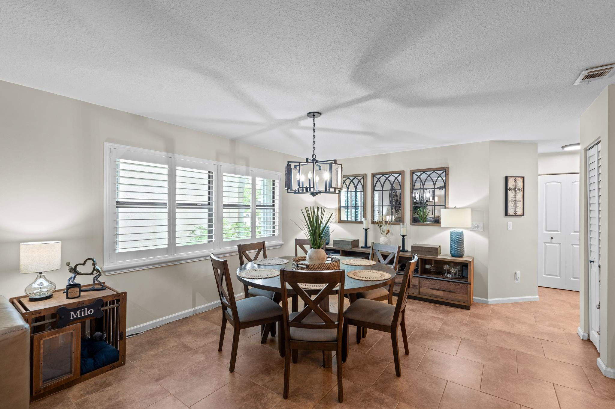 9601 Riverside Drive, Unit A6 Coral Springs, FL 33071 - Photo 9 of 25 a view of a dining room with furniture and window
