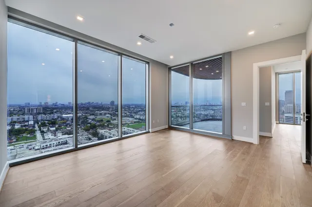 a view of hallway with a large window