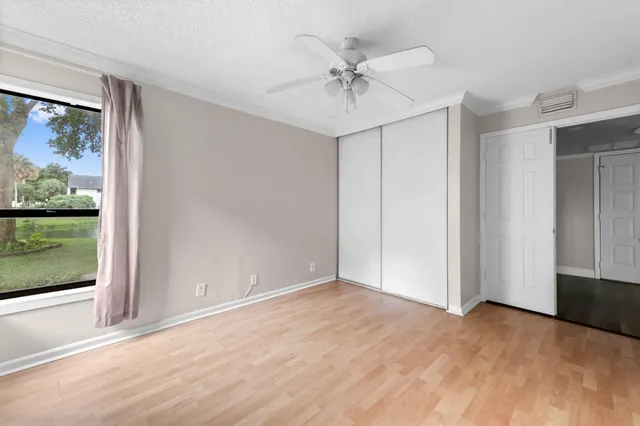 a view of an empty room with a window