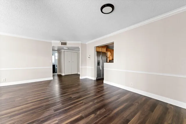 a view of a livingroom with wooden floor