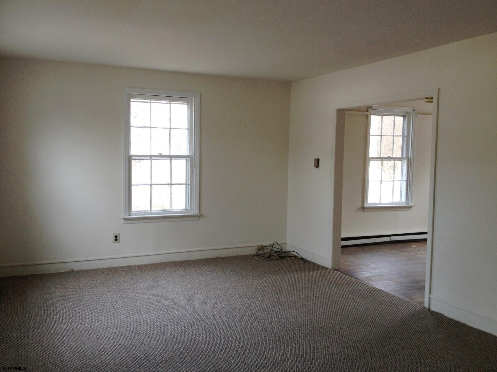 1305 A Matthews Avenue Mays Landing, NJ 08330 - Photo 3 of 14 an empty room with windows