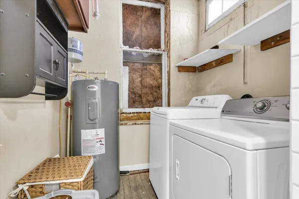 a utility room with dryer and washer