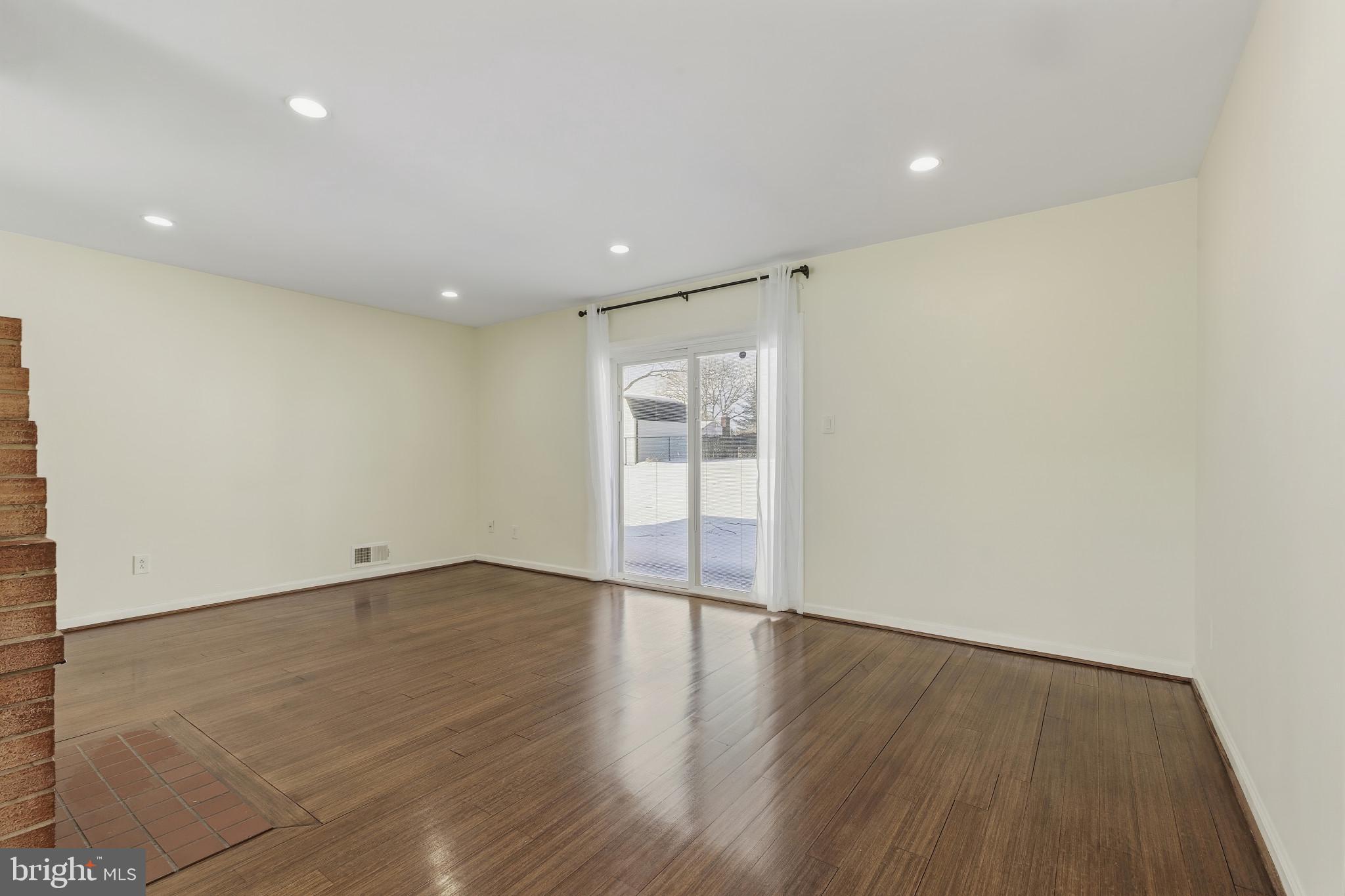 5412 Nutting Drive Springfield, VA 22151 - Photo 10 of 24 Living/family room with door to patio..