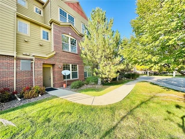 a view of a house with swimming pool