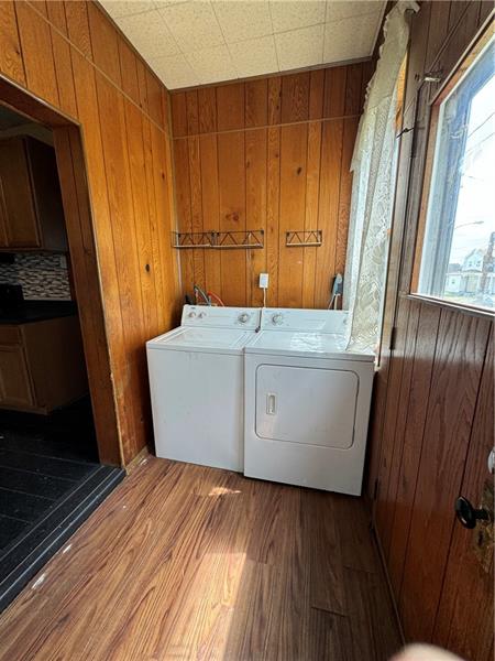 1012 11th Street McKees Rocks, PA 15136 - Photo 19 of 50 a room with wooden floor and utility