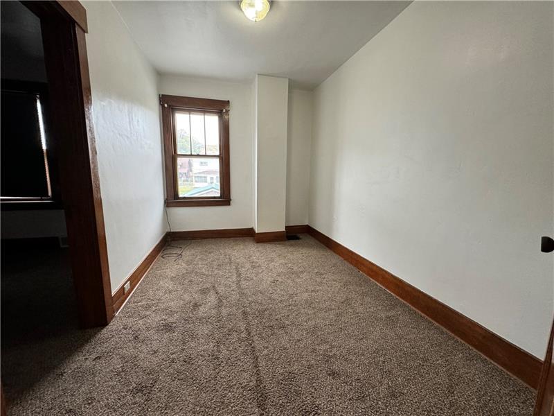 1012 11th Street McKees Rocks, PA 15136 - Photo 21 of 50 an empty room with a window
