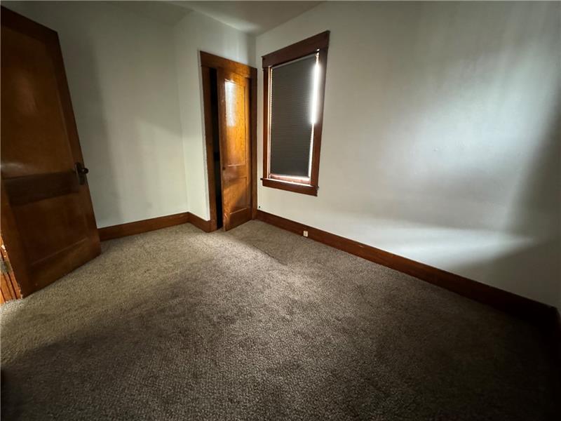 1012 11th Street McKees Rocks, PA 15136 - Photo 27 of 50 a view of an empty room and window