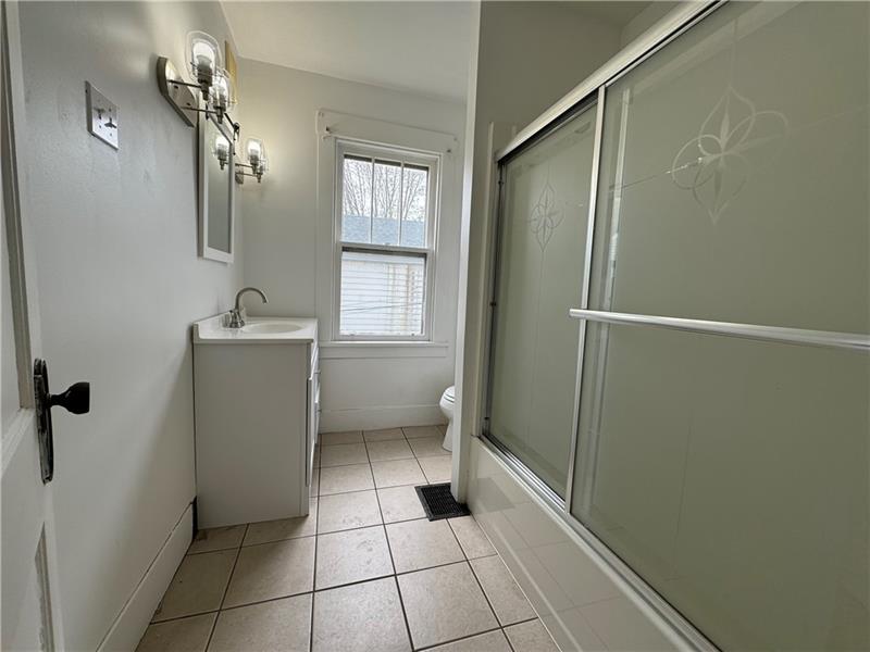 1012 11th Street McKees Rocks, PA 15136 - Photo 30 of 50 a bathroom with a sink toilet and shower