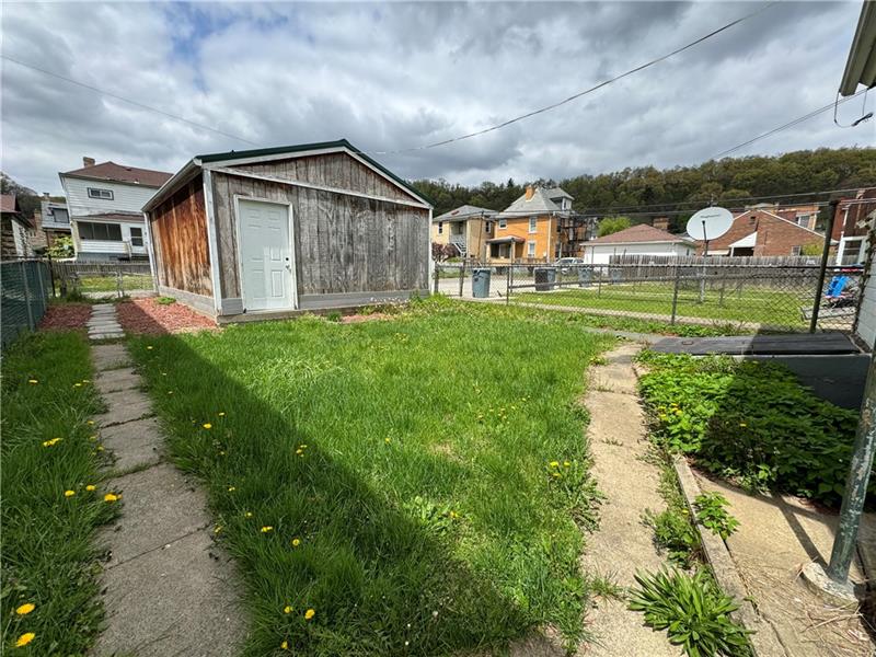 1012 11th Street McKees Rocks, PA 15136 - Photo 39 of 50 a view of a back yard of the house