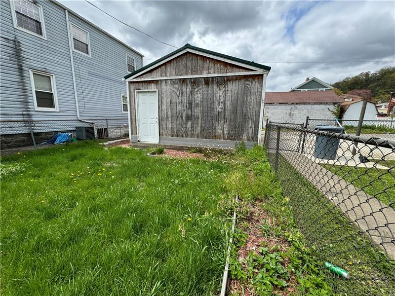 1012 11th Street McKees Rocks, PA 15136 - Photo 44 of 50 a view of backyard of house with green space