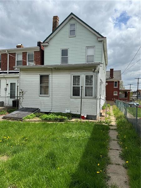 1012 11th Street McKees Rocks, PA 15136 - Photo 48 of 50 a front view of a house with a yard