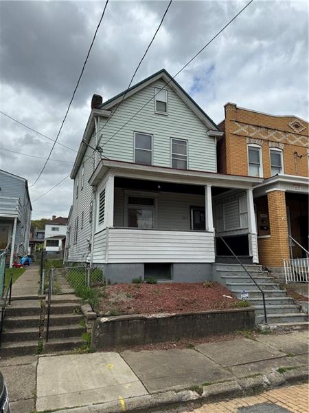 1012 11th Street McKees Rocks, PA 15136 - Photo 50 of 50 a front view of a house with a garage