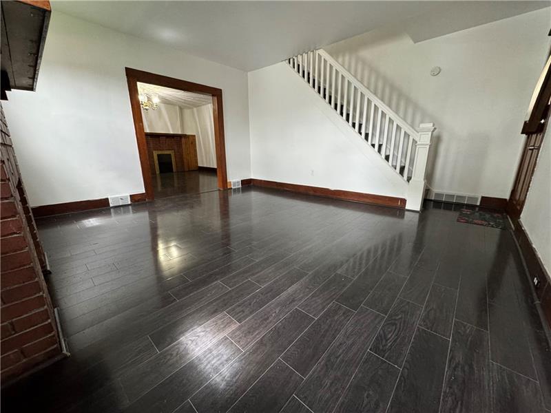 1012 11th Street McKees Rocks, PA 15136 - Photo 5 of 50 a view of entryway with wooden floor
